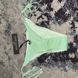 Green sparkle string bathing suit bottom
